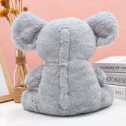 Emmy the Breathing Elephant, 4-in-1 Sleep Buddy with Rhythmic Breathing, Calming Melodies & Soft Glow Lights