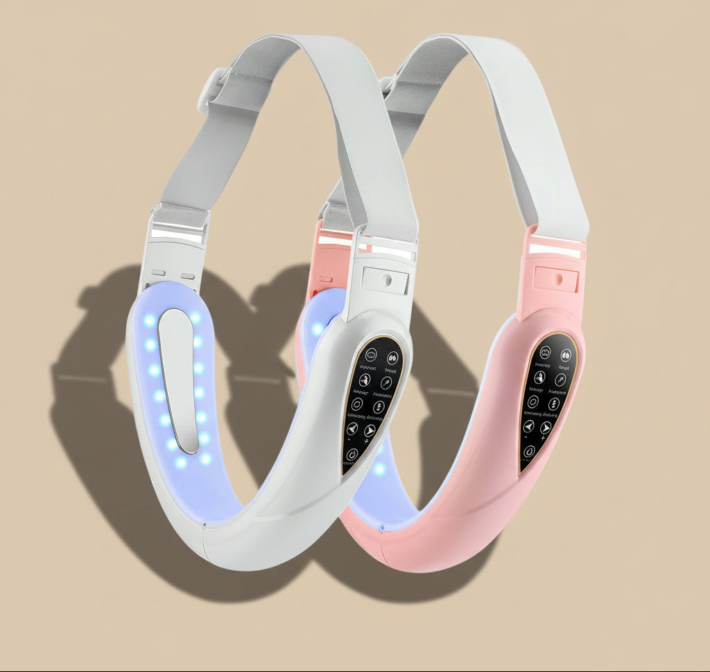 Two electronic dog collars, one white and one pink, on a gray background.