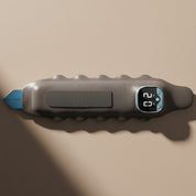 Gray and blue digital device on a gray background